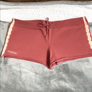 Speedo  womens size large stretchy shorts burnt reddish color with cream on side